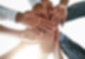 strengthened-as-team-closeup-shot-group-businesspeople-joining-their-hands-together-unity.