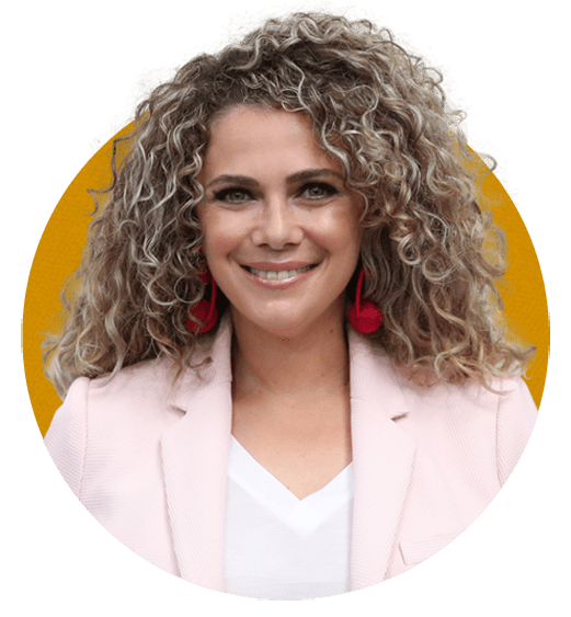 Portrait of Marie El Daghl, Head of Planning & Strategy, smiling with curly blonde hair, w
