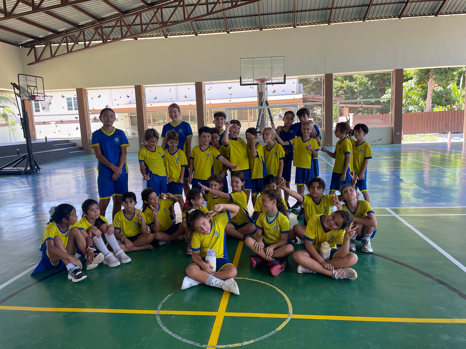 Students in yellow uniforms for Si Ri Panya News Highlights.