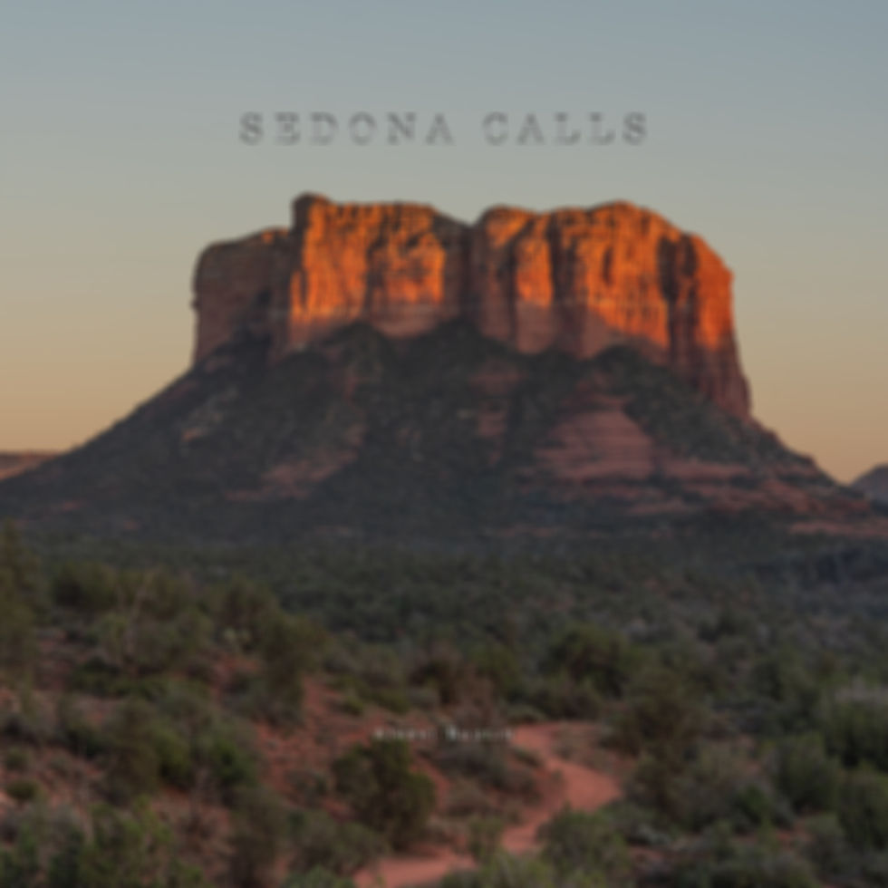 A dramatic view of Sedona's red rock cliffs glowing in warm evening light. The landscape symbolizes adventure, freedom, perseverance, self-discovery, and the journey toward becoming who you are meant to be.