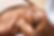 Beautiful african woman getting face massage in beauty spa. Black girl with closed eyes re