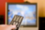 a-remote-control-in-hand-shallow-depth-o