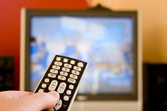 a-remote-control-in-hand-shallow-depth-o