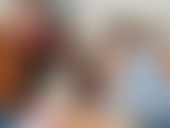 Students in class looking at an i-phone