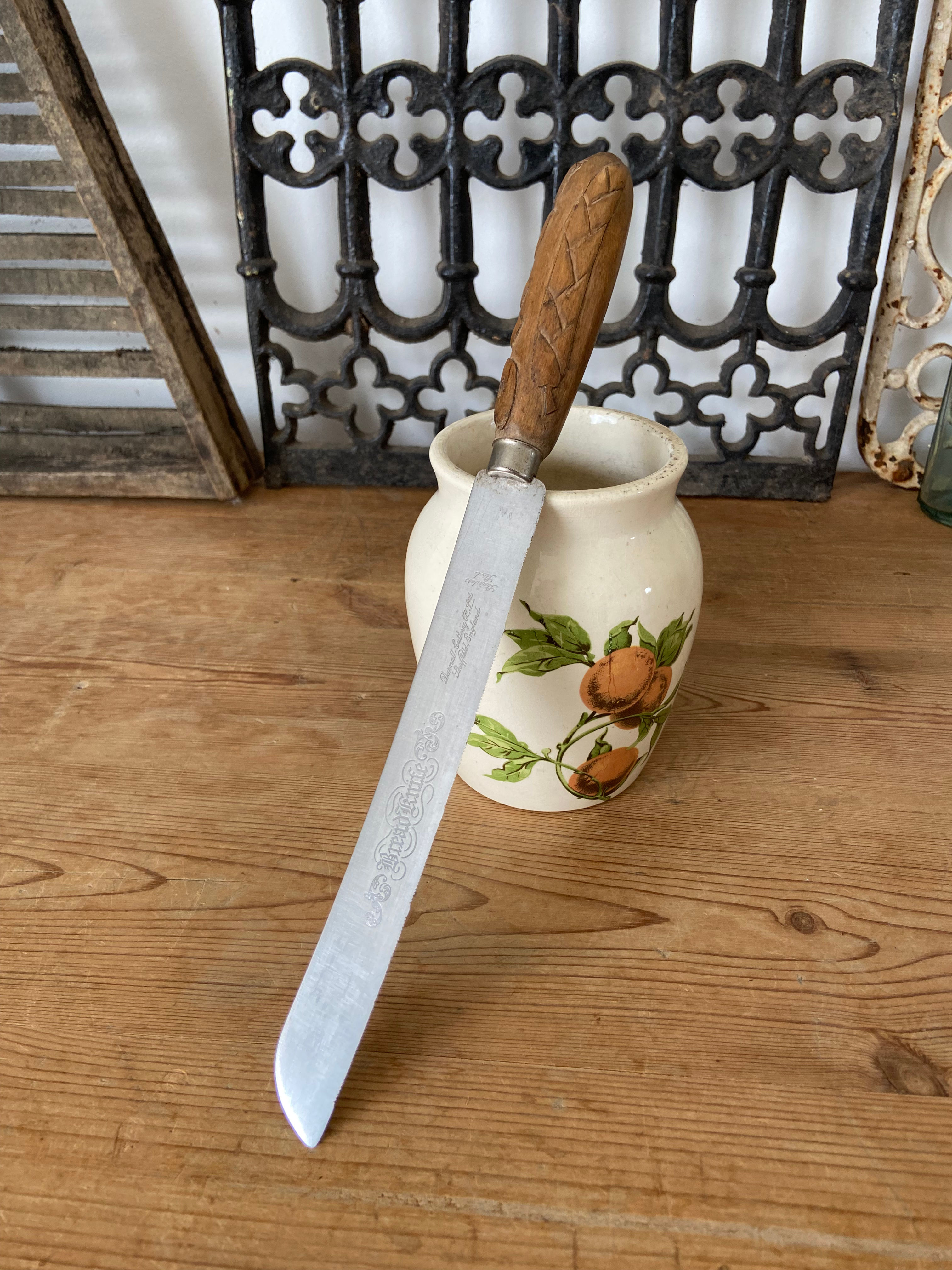 Antique Carved Handle Bread Knife - serrated blade
