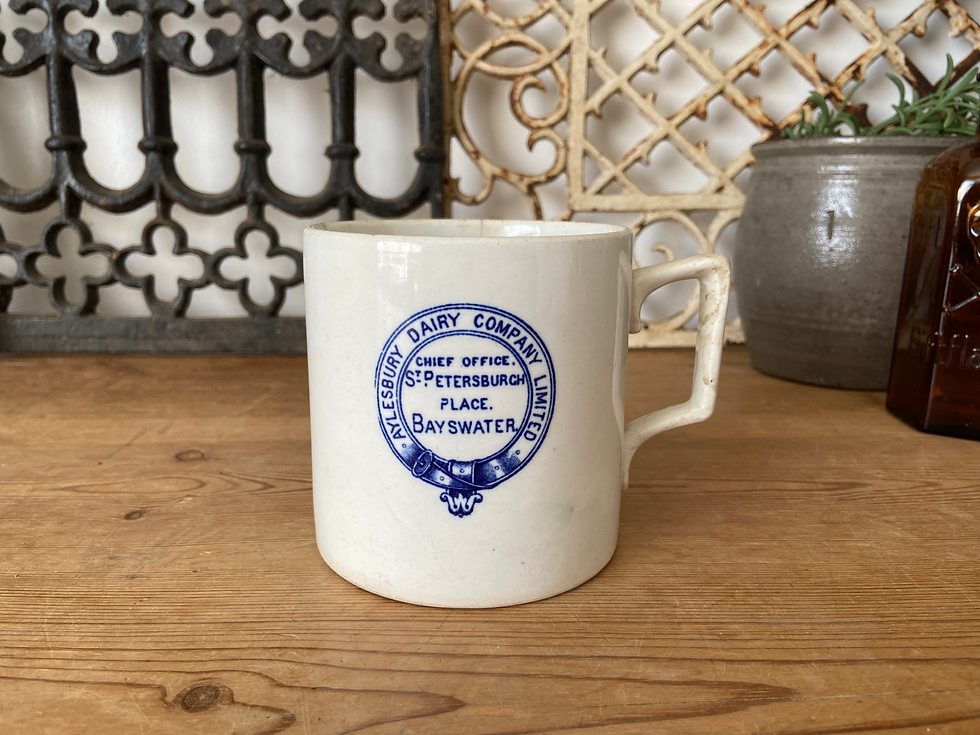 Large antique ironstone Aylesbury Dairy Company 1 pint measure mug