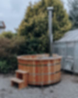 wellnass badezuber im grünen