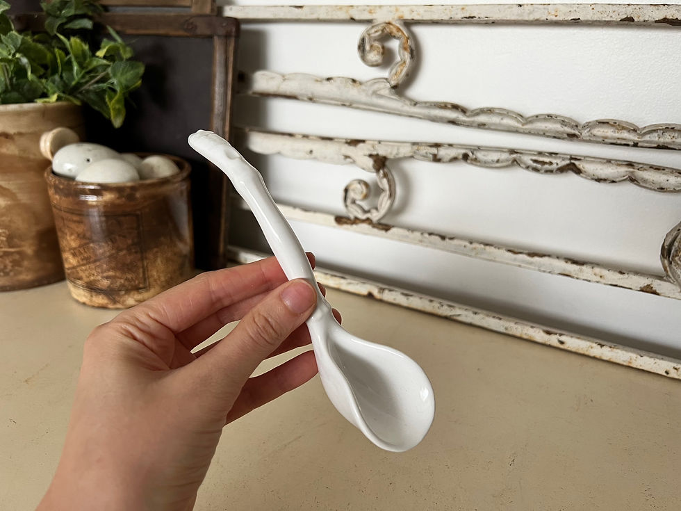 Unusual vintage white ceramic spoon
