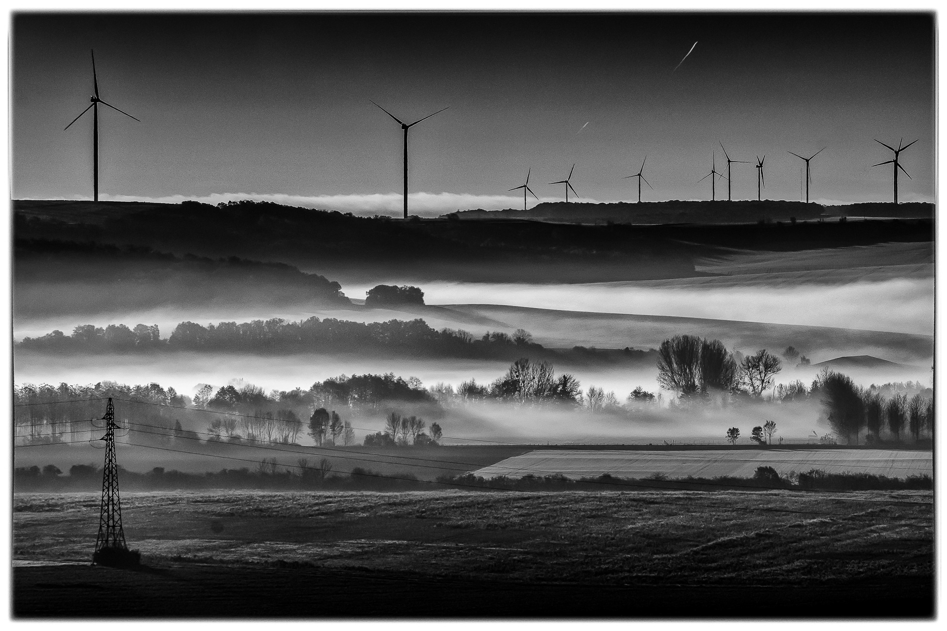 Windmills in the Fog