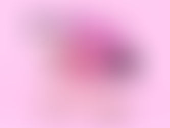 Image of a shopping trolley with shoppping bags in a fun purple and pink hue.