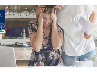 A couple trying to sort out paperwork for a will and an estate