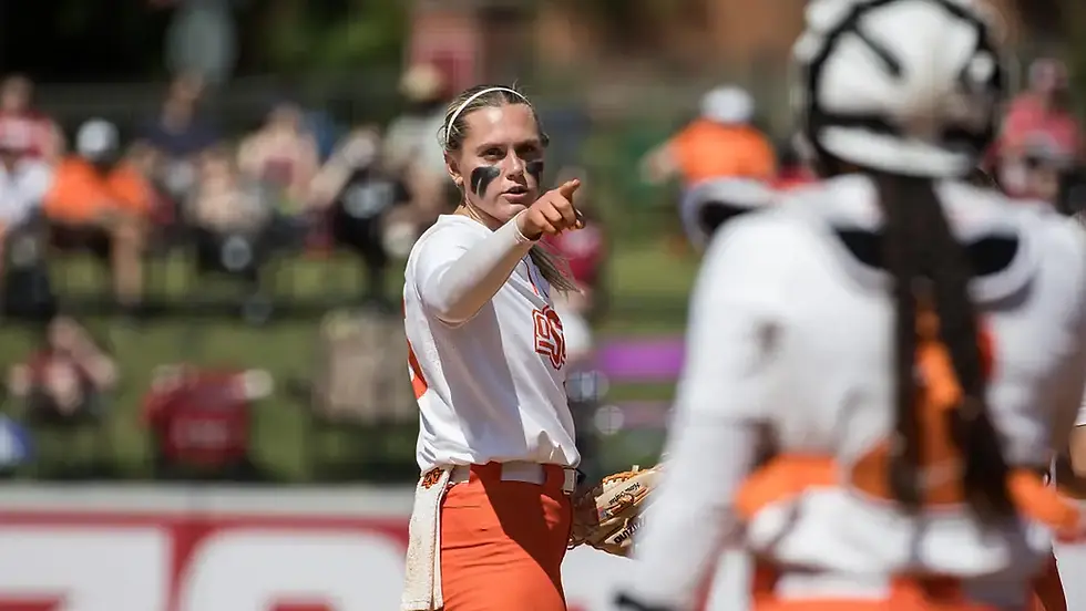 May 16, 2025; Fayetteville, AR, USA; Oklahoma State Cowgirls starting pitcher/relief pitcher Ruby Meylan (66) points to her catcher after an out during the third inning against the Indiana Hoosiers. Oklahoma State won 11-6. Mandatory Credit: Brett Rojo-Imagn Images | Brett Rojo-Imagn Images
