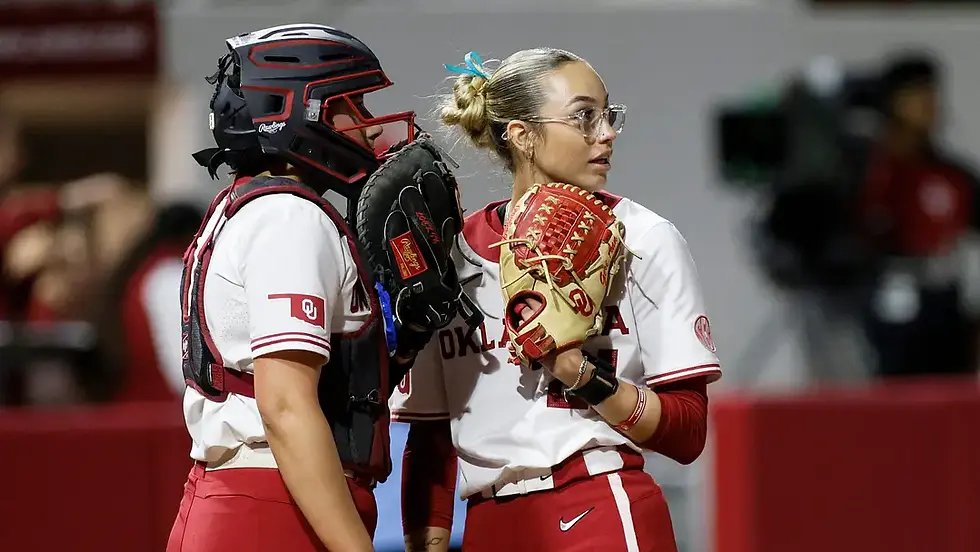Oklahoma catcher Isabela Emerling, left, and pitcher Sam Landry, right, talk during an NCAA softball game between the Oklahoma Sooners (OU) and the Tennessee Lady Volunteers at Love's Field in Norman, Okla., Friday, March 28, 2025. | NATE BILLINGS/FOR THE OKLAHOMAN / USA TODAY NETWORK via Imagn Images