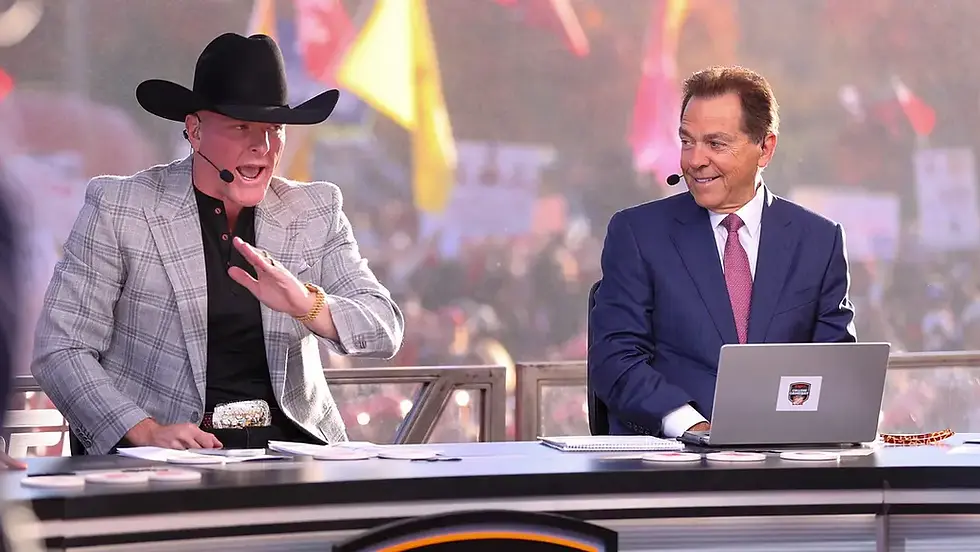 ESPN personality Pat McAfee talks during College GameDay as Nick Saban looks on. | Nathan Giese/Avalanche-Journal / USA TODAY NETWORK via Imagn Images
