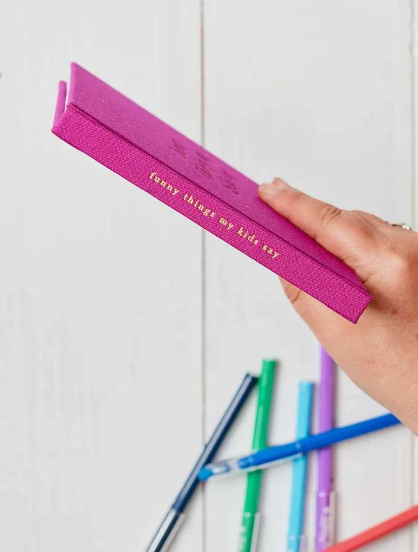 Thumbnail: magenta linen cover of book