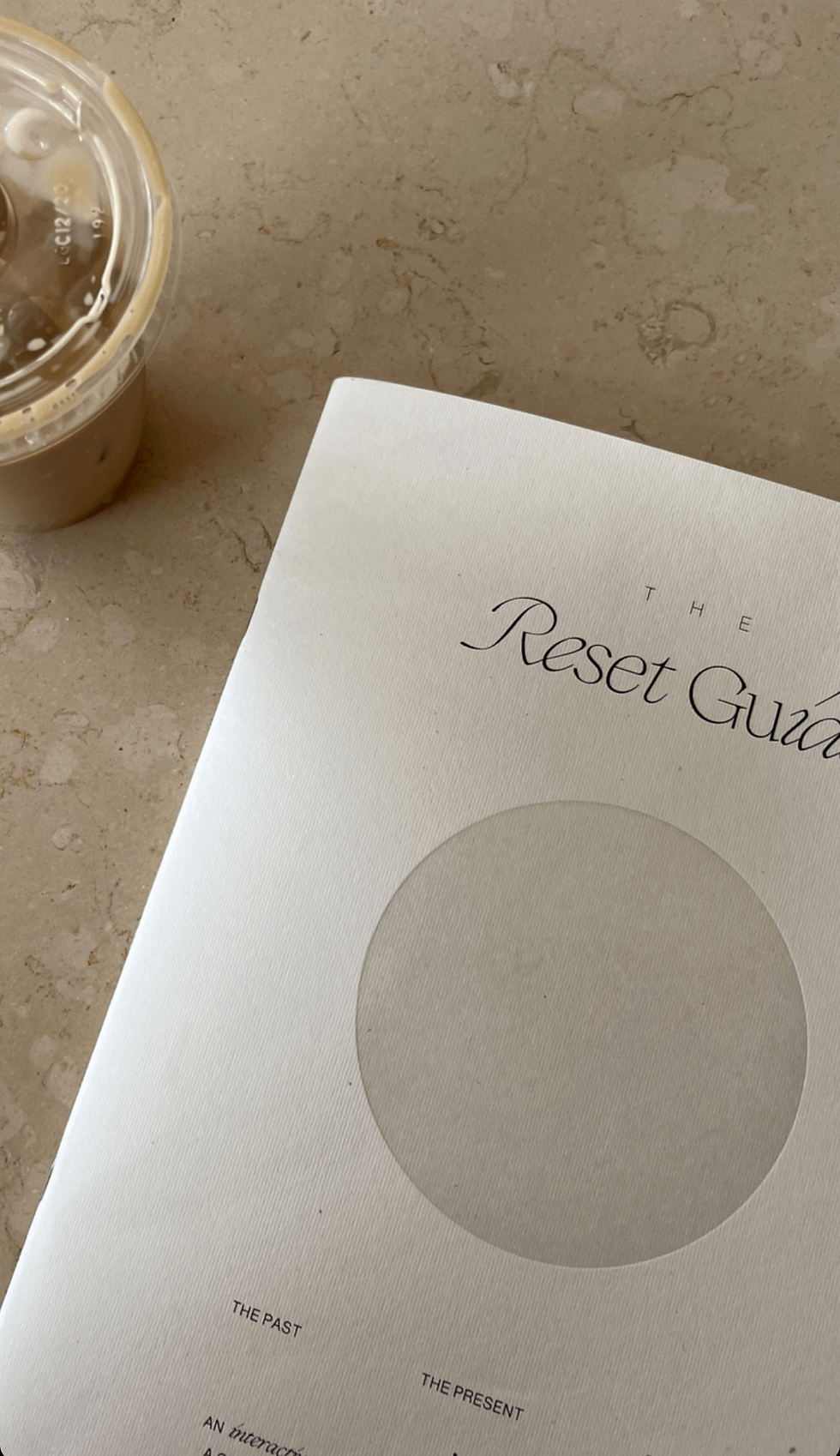 The Reset Guide by Wilde House Paper with a minimal cover with a circle on the front
