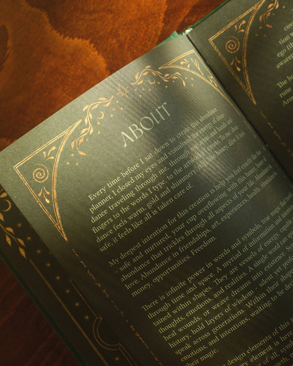 Thumbnail: inside pages of emerald green abundance planner