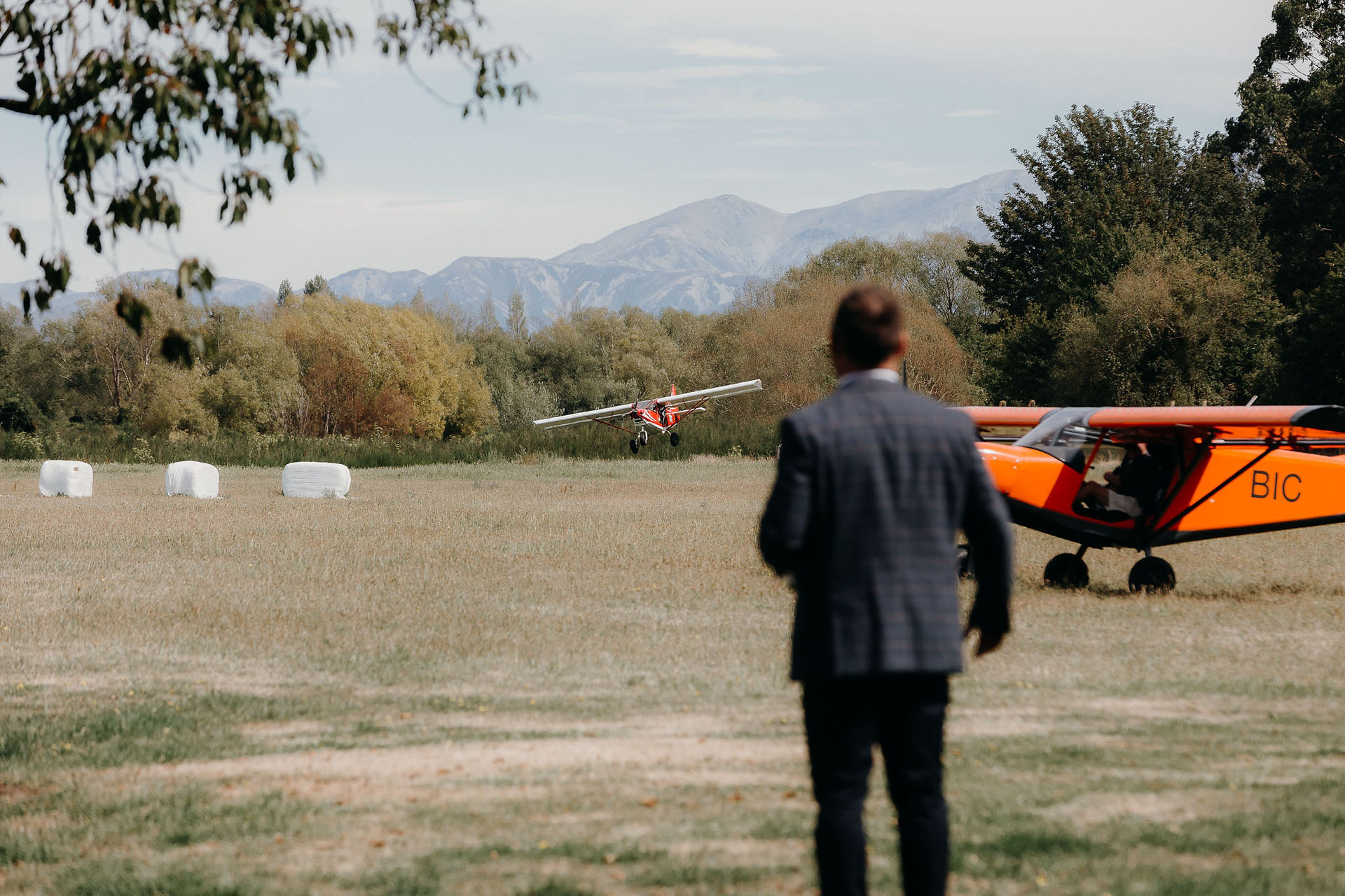 planes coming to land at private airfield