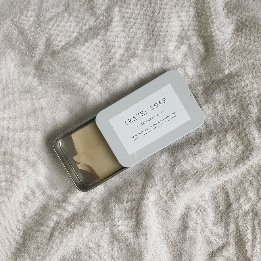 Thumbnail: handcrafted soaps in a tin.