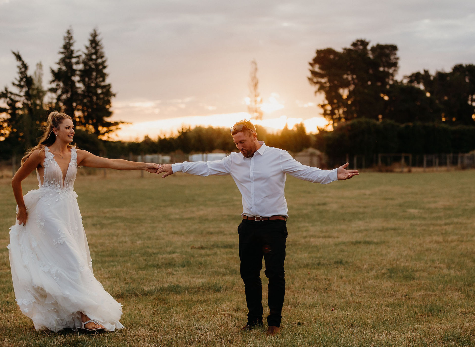 Bride and groom during sunset wedding photos in North Canterbury