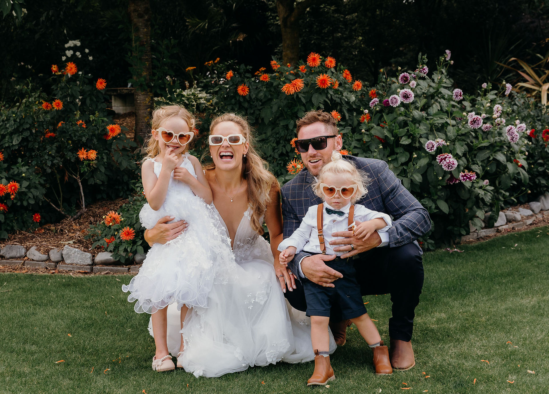 Bride and groom with their children during the wedding ceremony