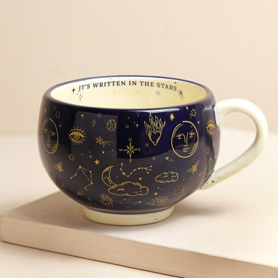 Navy crescent moon mug with gold stars and moon detailing.