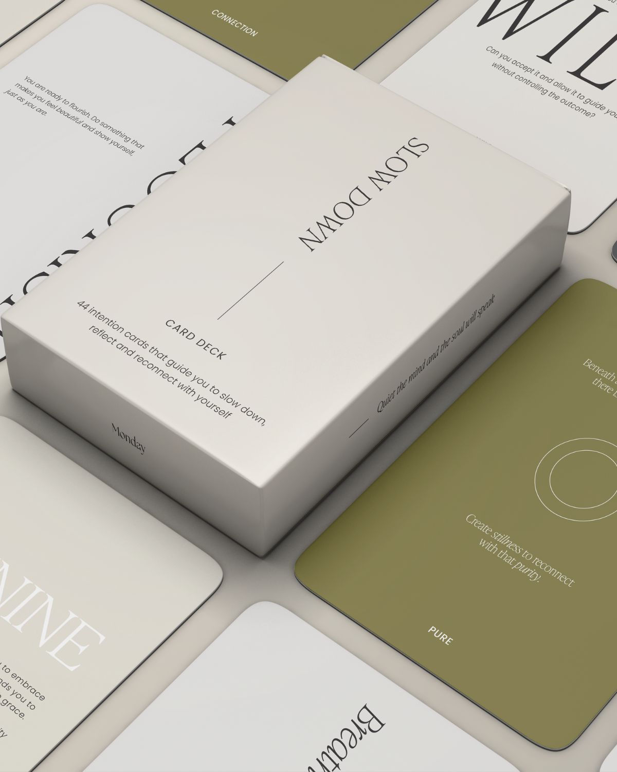 Monday Slow Down Card Deck box surrounded by illustrated reflection and intention cards