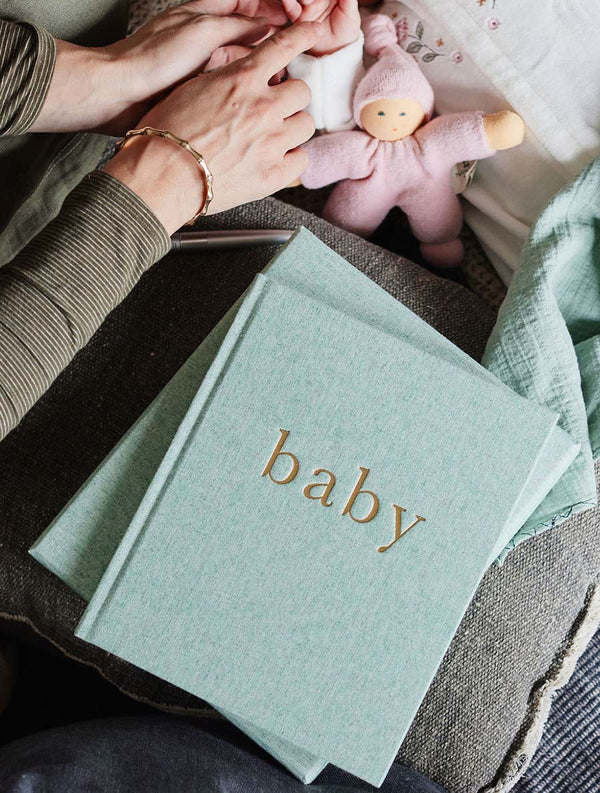 seafoam cover of baby. first year of you journal