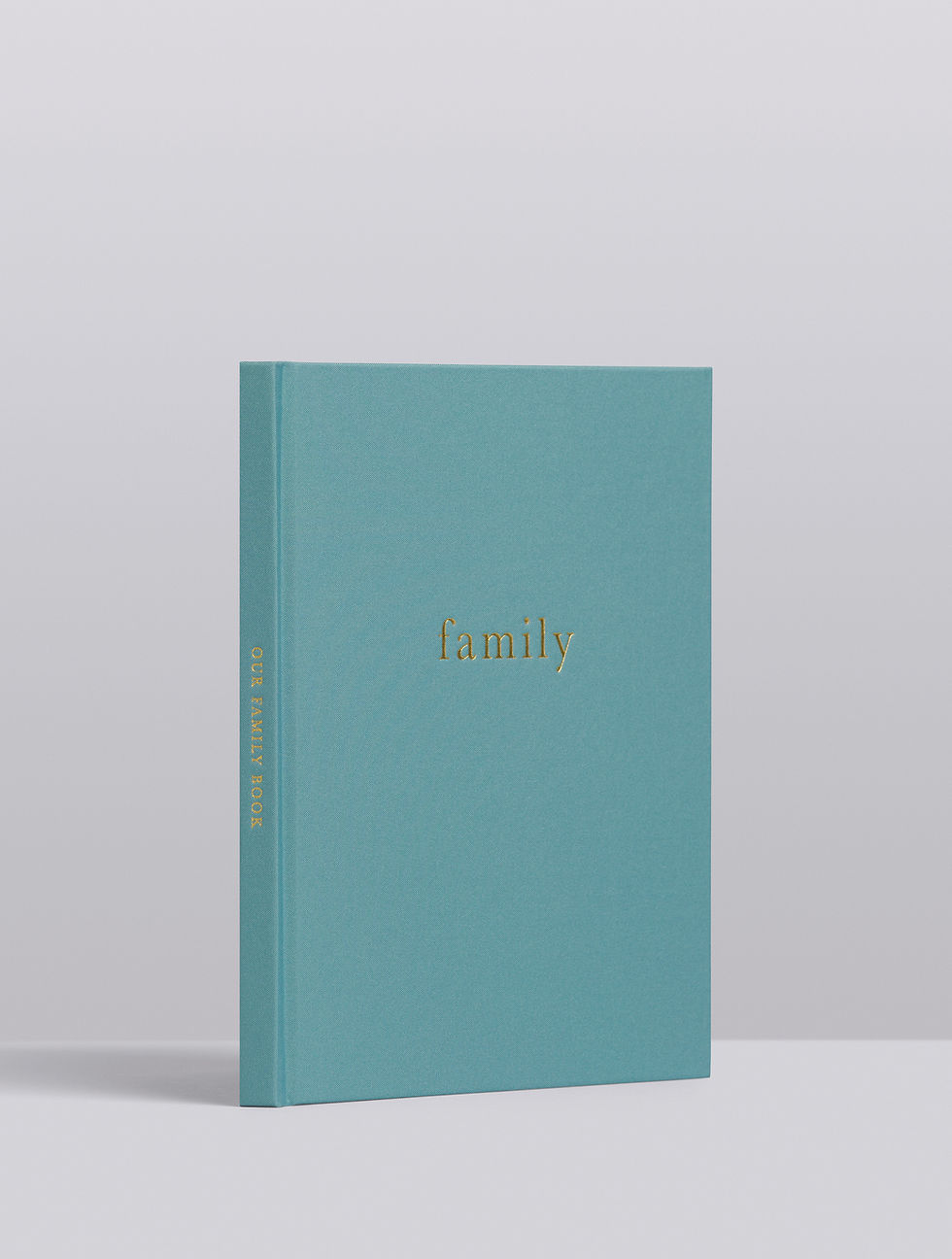 Thumbnail: hardcover linen teal journal with Family written in gold foil font