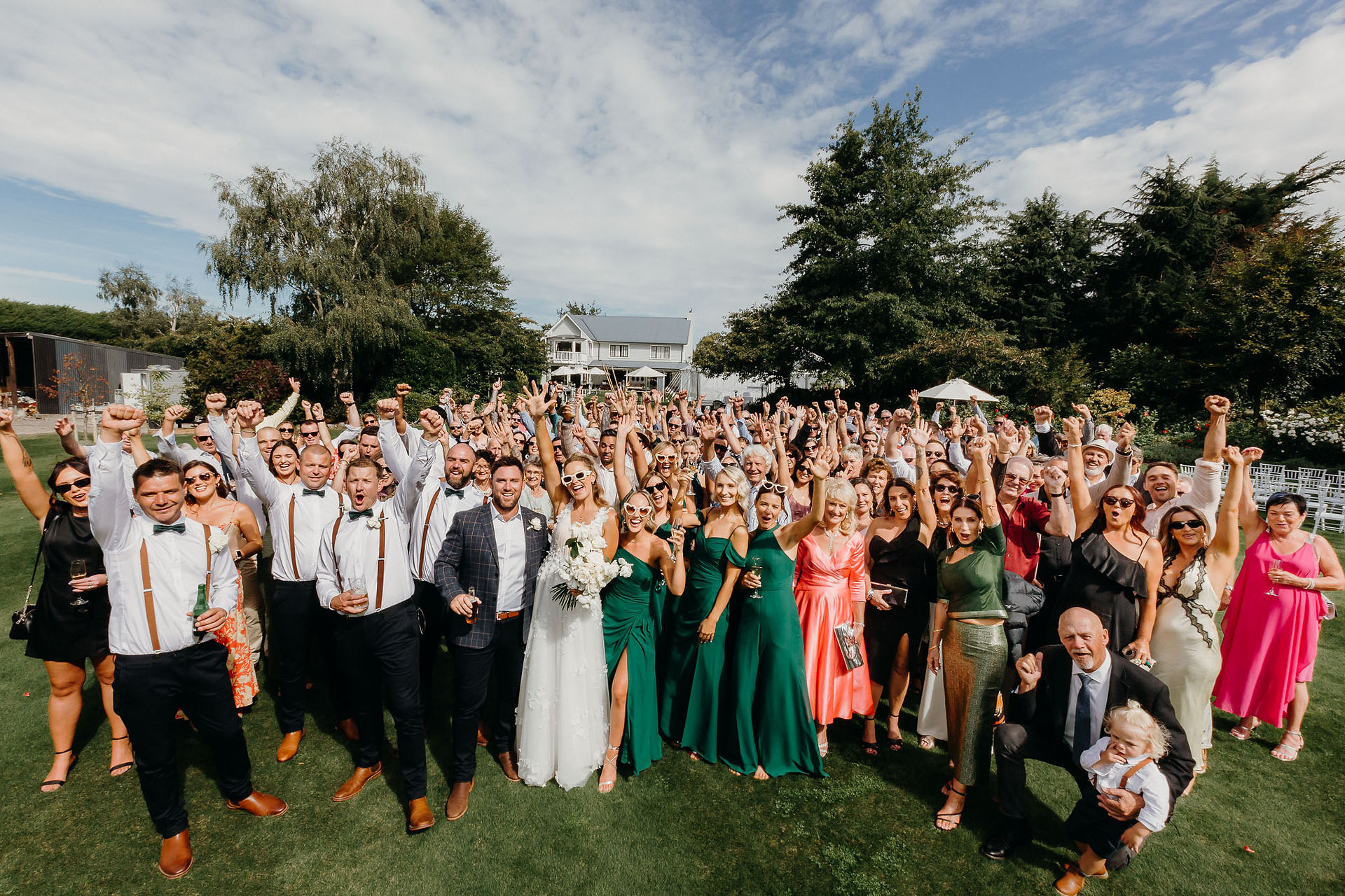 Newlyweds celebrating after their outdoor Canterbury ceremony