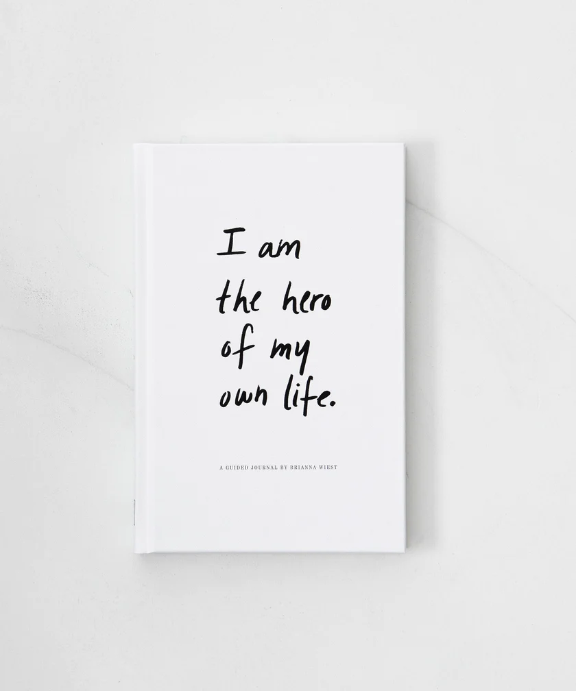 front white cover with black font of I am the hero of my own life book