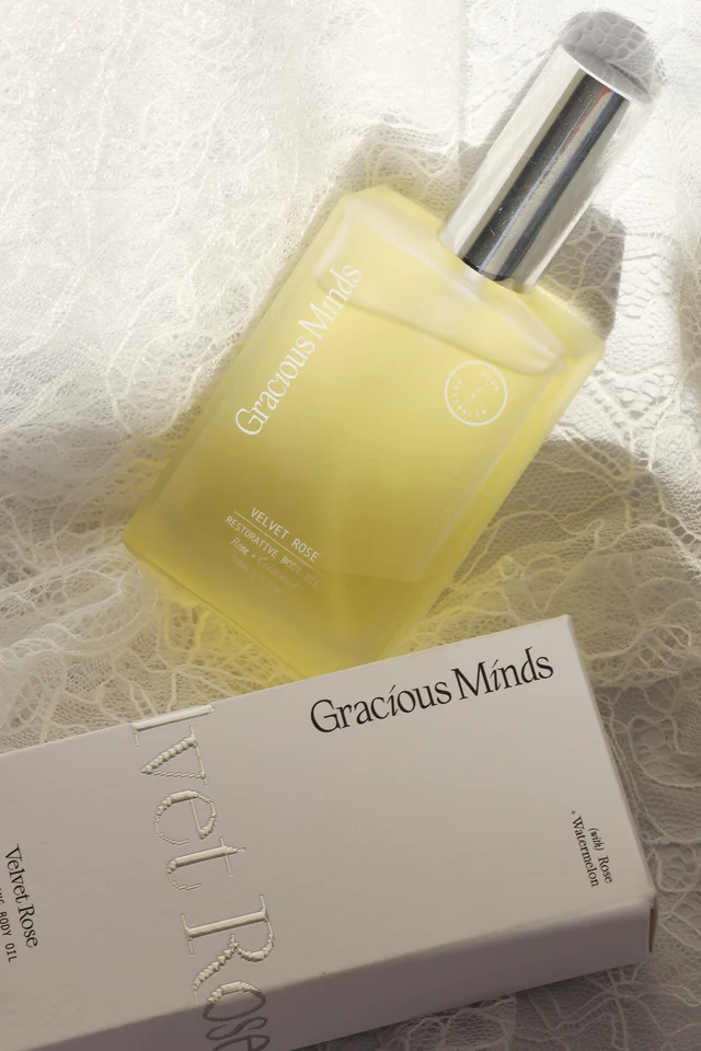 pale yellow restoring body oil in glass bottle from Gracious Minds
