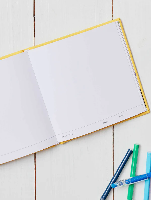 yellow covered linen journal of Drawings from my Child