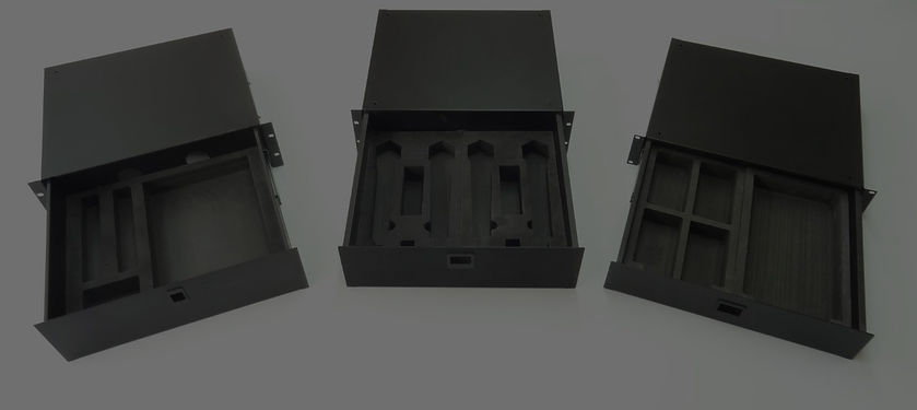 Rack drawer organizers made of custom foam and placed within rack drawers