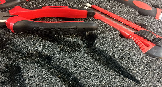 Close up of molded case interior that helps organize tools with custom cut foam