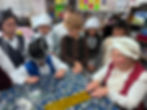 Fourth-graders at C.V. Starr participate in a recent Colonial Fair. Photos by Brewster Central School District.