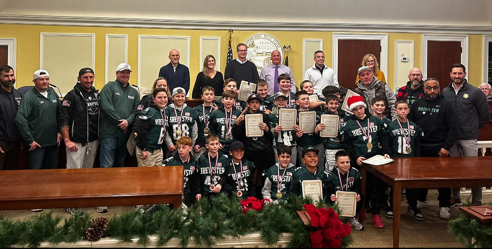 Players, coaches, and parents of the Brewster Bruins 10U Football Team were recognized during the Dec. 4 Southeast Town Board meeting for another undefeated season. Provided photo.