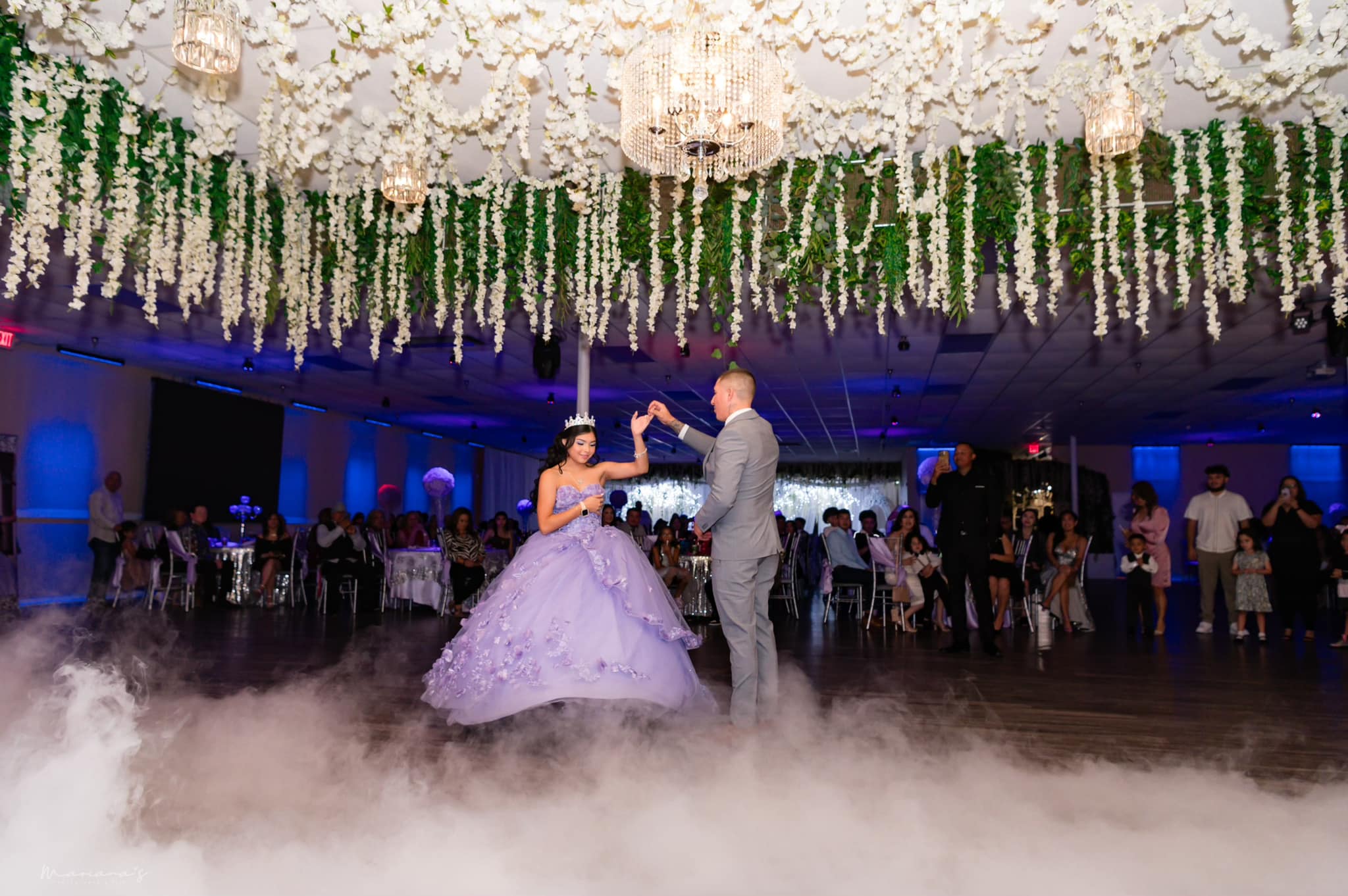 San Antonio quinceañera venue banquet hall decorated with florals and reception tables