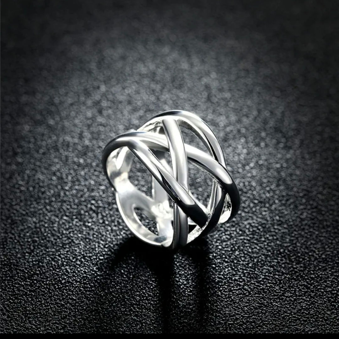 Cross intertwined ring
