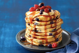 Blueberry and custard pancakes with caramel sauce