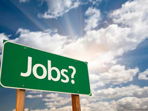 A highway sign that reads "Jobs?"
