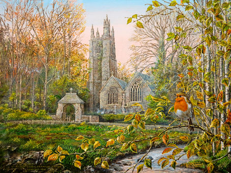 A robin singing in a tree by a church