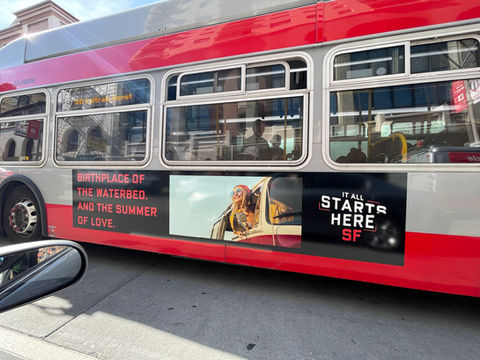 It Starts Here SF campaign photo showing bus with decal.