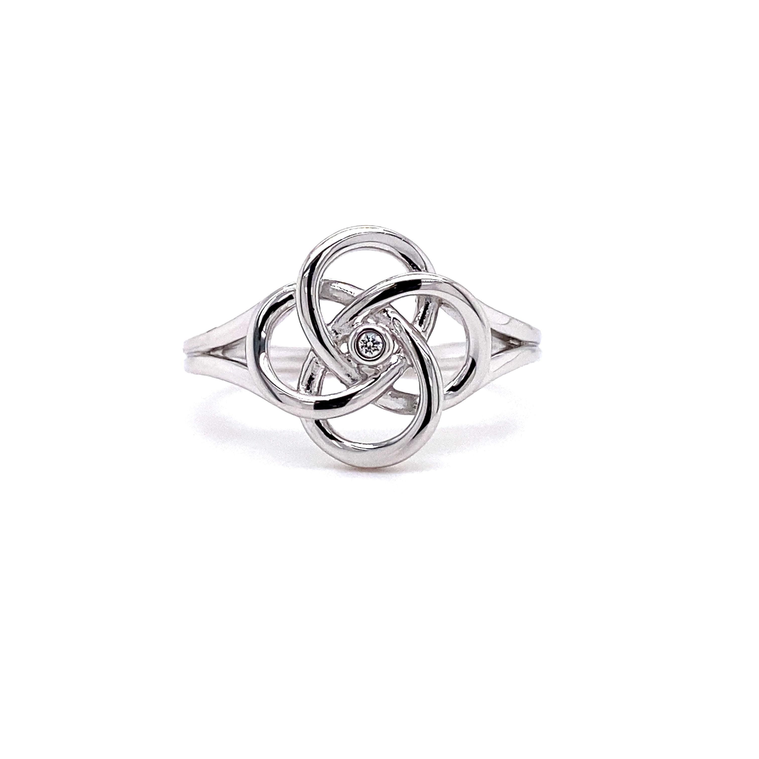 STERLING SILVER AND DIAMOND RING