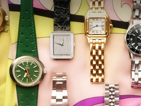 collection of luxury watches on colorful background