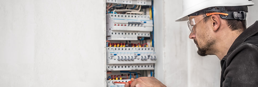 man-electrical-technician-working-switchboard-with-fuses-installation-connection-electrica