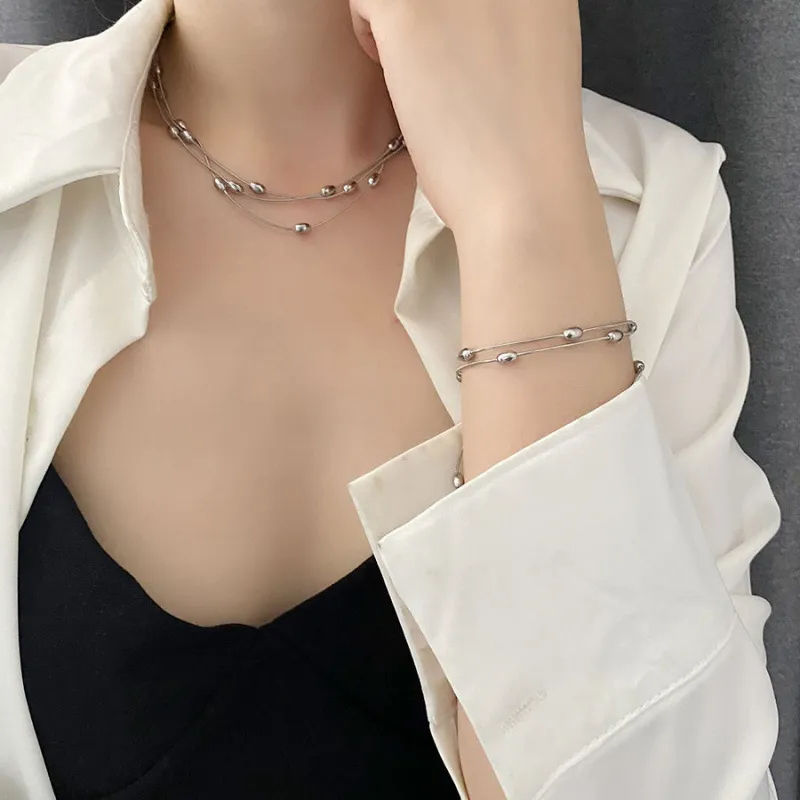 Thumbnail: Handmade Geometric Layered Titanium Steel Necklace and Bracelet Set