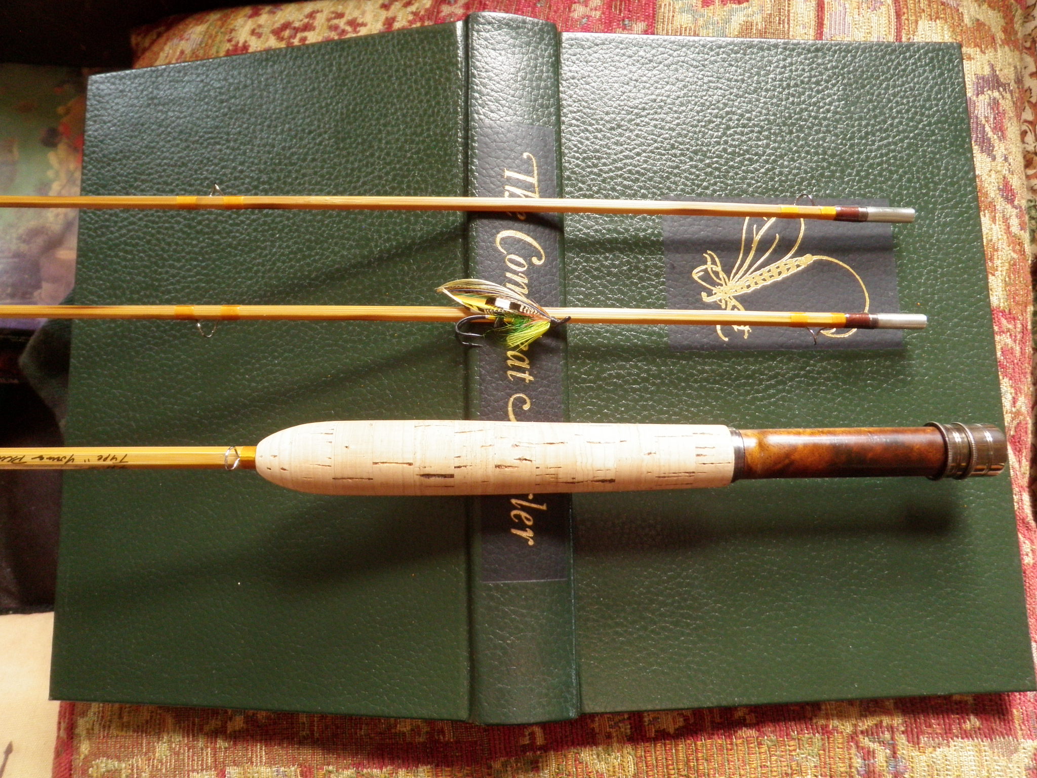 Walton and rod and salmon fly.