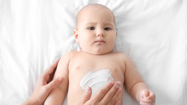 Lotion on a baby