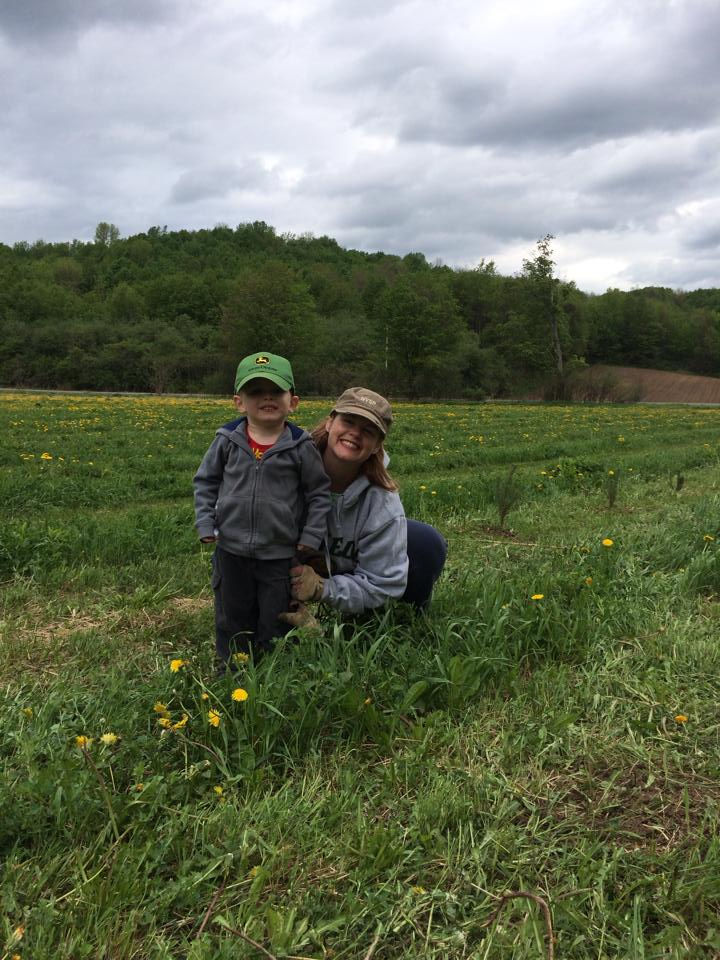 Our son and I after planting our first 250 Christmas tree seedlings!